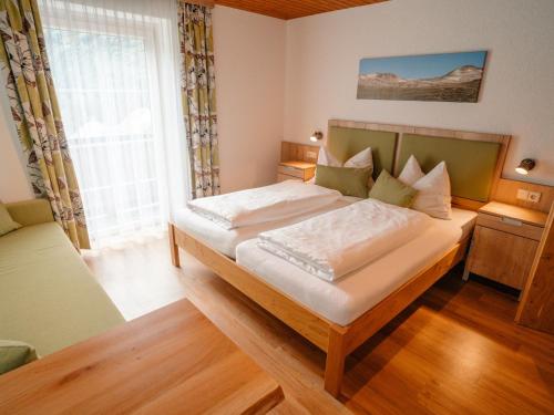 Postel nebo postele na pokoji v ubytování Apartment Furrach by Interhome