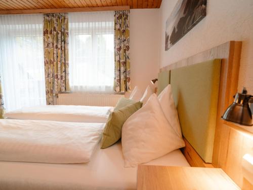 Postel nebo postele na pokoji v ubytování Apartment Furrach by Interhome