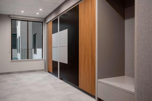 an office hallway with glass doors and a window at Homewood Suites By Hilton Missoula in Missoula