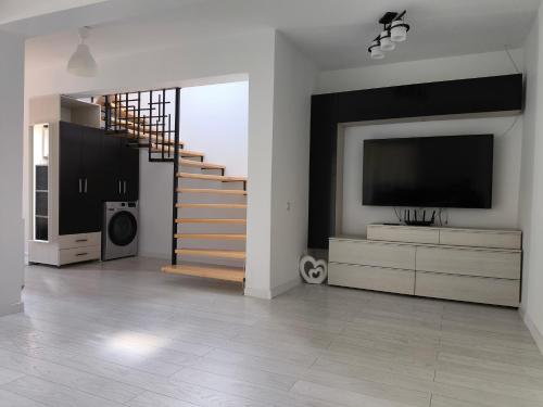 TV a/nebo společenská místnost v ubytování Ola's House