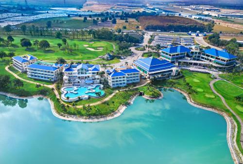 an aerial view of the resort and the water at Pattana Sports Resort in Si Racha