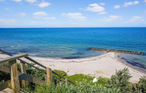 a view of a beach with the ocean at 3 Bedroom Beautiful Home In Melby in Melby