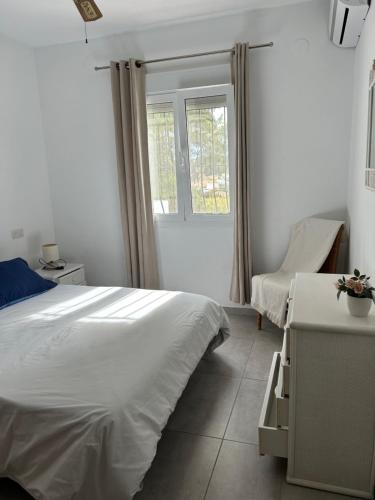 Een bed of bedden in een kamer bij Tranquil setting