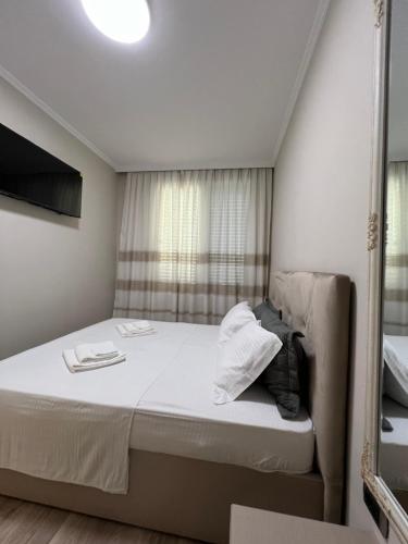 Postel nebo postele na pokoji v ubytování Center View Luxury Apartment