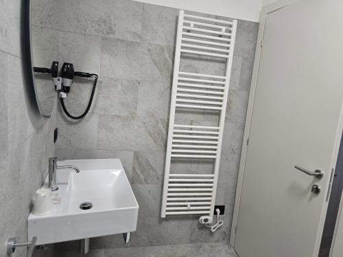 Koupelna v ubytování Albergo Al Gambero