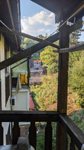a view from a wooden balcony of a house at Gordana in Senjski Rudnik
