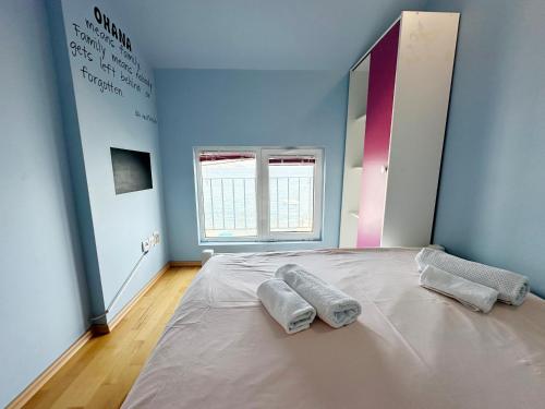 Ένα ή περισσότερα κρεβάτια σε δωμάτιο στο Seaside Apartments