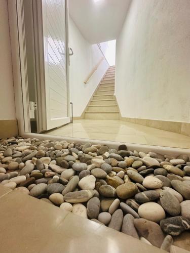 a pile of rocks on the floor of a building at Heart of Brač in Supetar