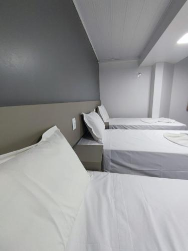 Katil atau katil-katil dalam bilik di PORTAL PARQUE HOTEL