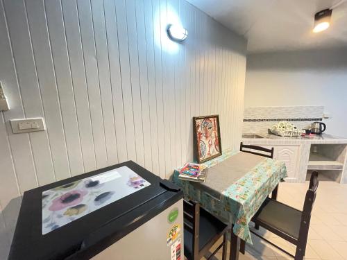 a room with a table and a table and a table and a tableablish at Impact Arena C3 Milo in Nonthaburi