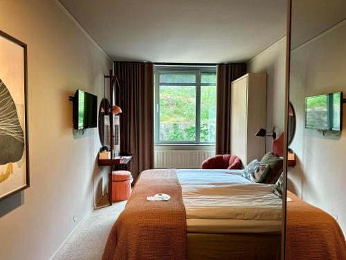 Postel nebo postele na pokoji v ubytování Spar Hotel Majorna