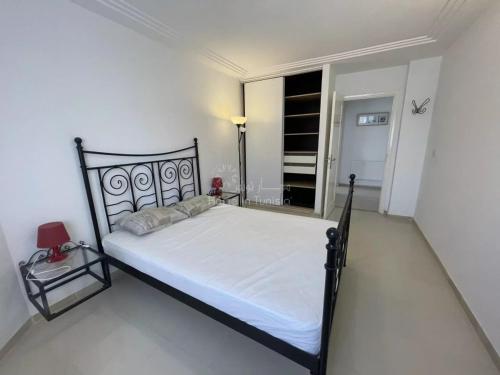 Katil atau katil-katil dalam bilik di Location saisonniere Appartement Tantana