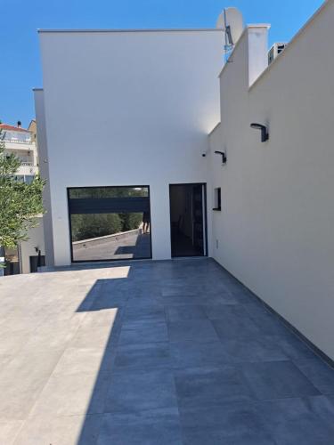 a view from the outside of a white building at Villa Zdenko in Omiš