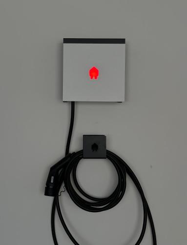 a computer with a cord hooked up to a laptop at Kempinski Villa 100m from Beach in Savudrija