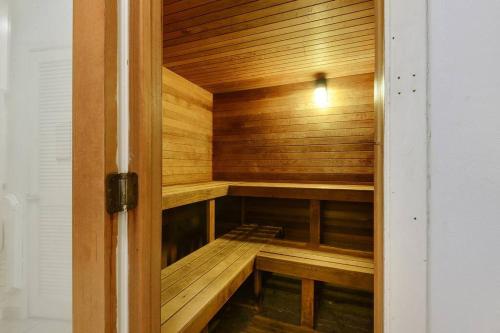 a wooden sauna with wooden shelves in a room at Windward Pointe 801- East corner-unit beachfront in Orange Beach