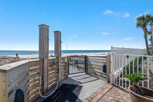 a wooden deck with a view of the beach at Windward Pointe 801- East corner-unit beachfront in Orange Beach