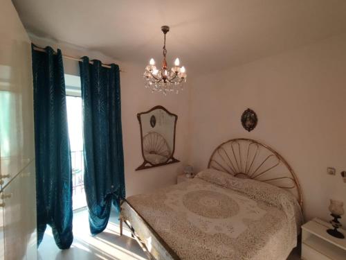 Postel nebo postele na pokoji v ubytování Casa della Nonna