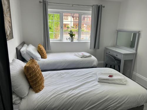 Postel nebo postele na pokoji v ubytování Stylish Flat in London