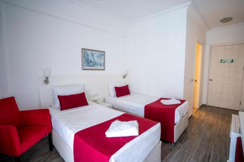 Llit o llits en una habitació de Ayapam Hotel