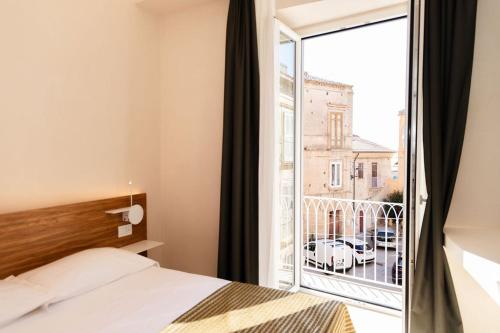 Ένα ή περισσότερα κρεβάτια σε δωμάτιο στο Sun serenity Suite