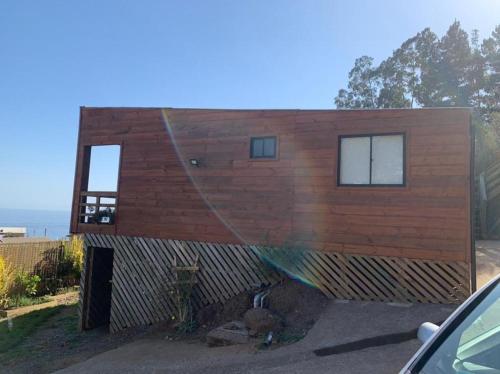 a house being built with a hose at Arriendo Diario Casa en la Playa Pelluhue Maule Chile in Pelluhue