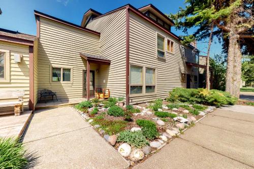 a house with a garden in front of it at 4412 Mackinaw in Wilson