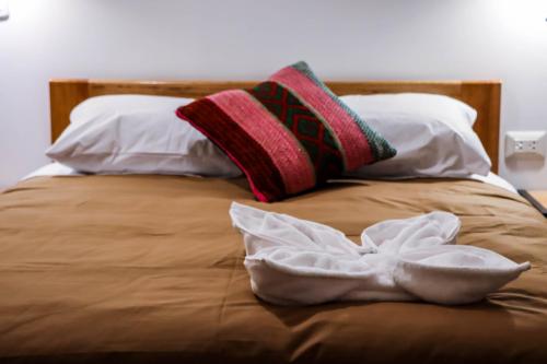 Cama o camas de una habitación en Andes House Cusco