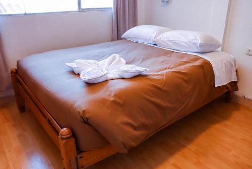 Cama o camas de una habitación en Andes House Cusco