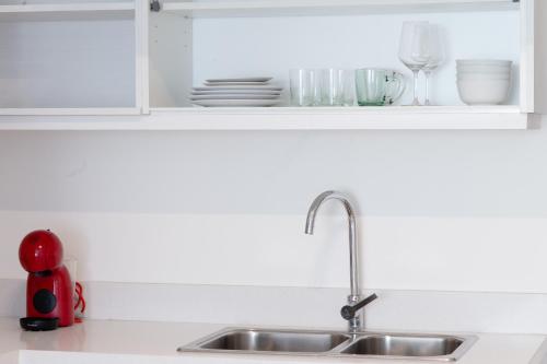 Η κουζίνα ή μικρή κουζίνα στο Mirto Beautiful Suite