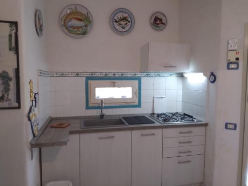 Cuisine ou kitchenette dans l'établissement Casa Pomelia