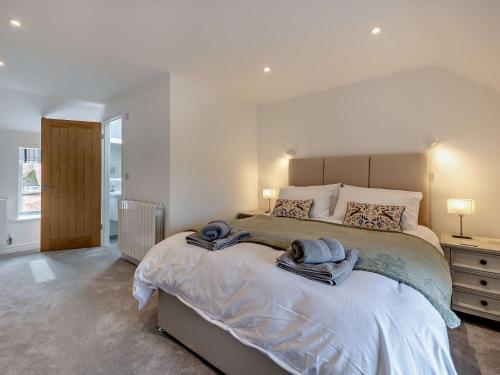 Ένα ή περισσότερα κρεβάτια σε δωμάτιο στο 4 Bed in Howden 93496