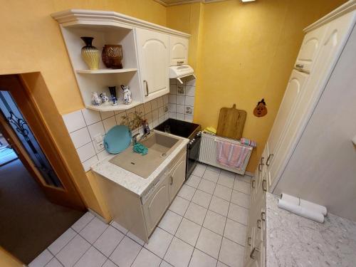 Kuchyň nebo kuchyňský kout v ubytování Doppelzimmer 2 mit Aufbettung Erdgeschoß