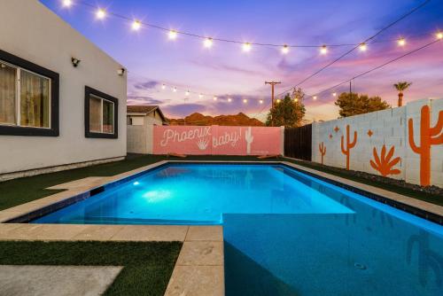 a swimming pool in the backyard of a house at Heated Pool Game Room, Mountain Views in Phoenix