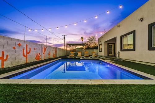 a swimming pool in the backyard of a house at Heated Pool Game Room, Mountain Views in Phoenix