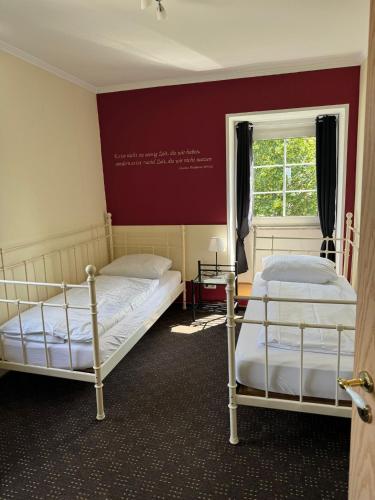 Ένα ή περισσότερα κρεβάτια σε δωμάτιο στο Schloss Hotel Kastellaun