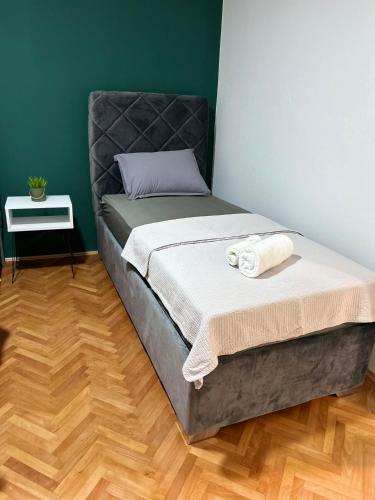 Un ou plusieurs lits dans un hébergement de l'établissement Apartman Jurica