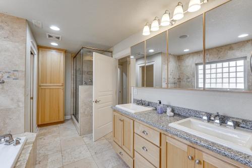 a bathroom with two sinks and a shower at 8 Mi to Jacksonville Oregon Getaway with Deck! in Jacksonville