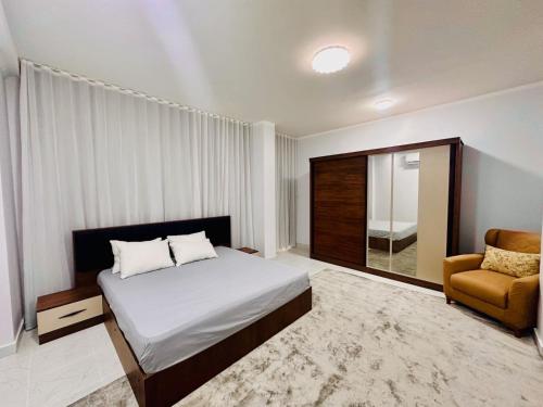 Кровать или кровати в номере Abbady tower
