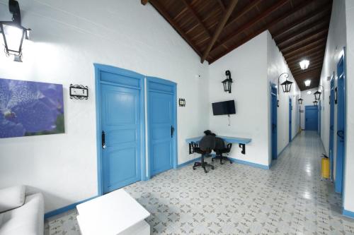 TV a/nebo společenská místnost v ubytování Hotel Concepción Antioquia