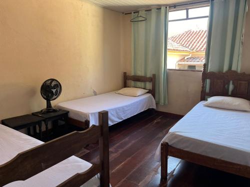 Ένα ή περισσότερα κρεβάτια σε δωμάτιο στο Hostel Diamante