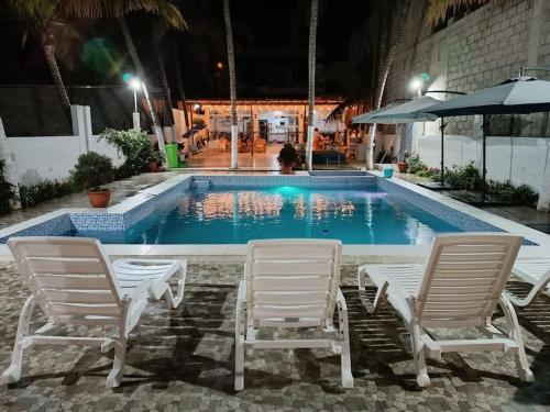 Πισίνα στο ή κοντά στο Casa de Playa Palmeras
