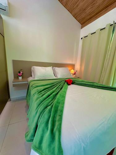 Katil atau katil-katil dalam bilik di Solar Água Apartaments