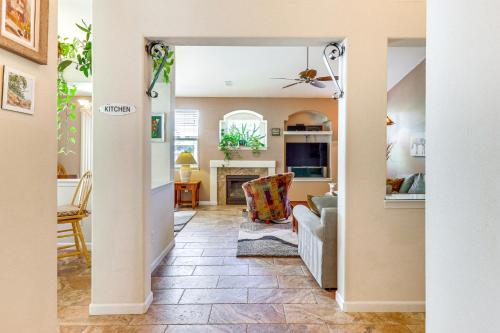 a living room with a couch and a fireplace at Reno Home with Game Room 5 Mi to Downtown! in Reno