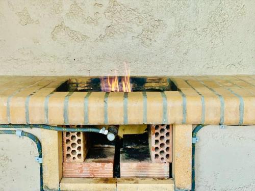 a wooden table with a hive at Astali Villa in Stalida