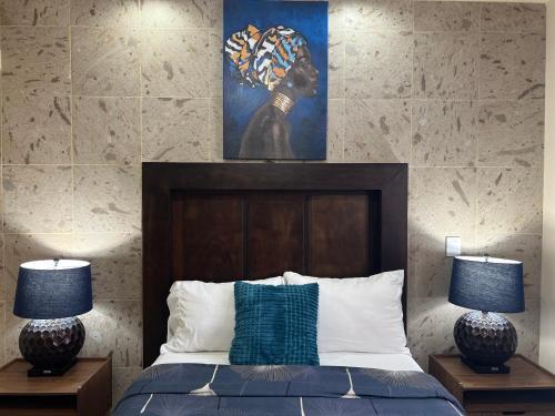 Ένα ή περισσότερα κρεβάτια σε δωμάτιο στο Ancla Suites Hotel - 2 Bedroom Apartments