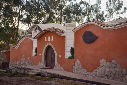a small house that looks like a play house at Wifala Harmony Hotel in Urubamba