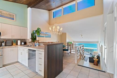 a kitchen with a view of the ocean at Picturesque Perfection in Leucadia Encinitas in Encinitas