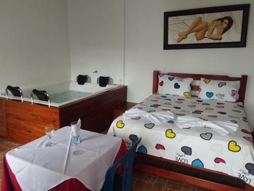 Una cama o camas en una habitación de Hotel Palmarito