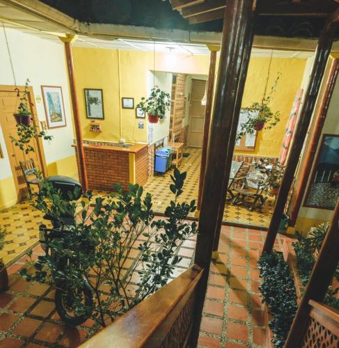 a view of a room with potted plants at Hotel Colonial in Jardin