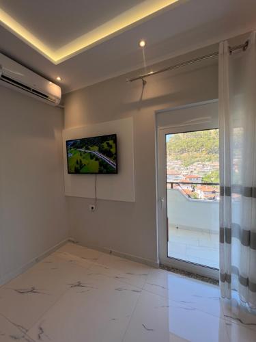 Guesthouse BellaVistaにあるテレビまたはエンターテインメントセンター